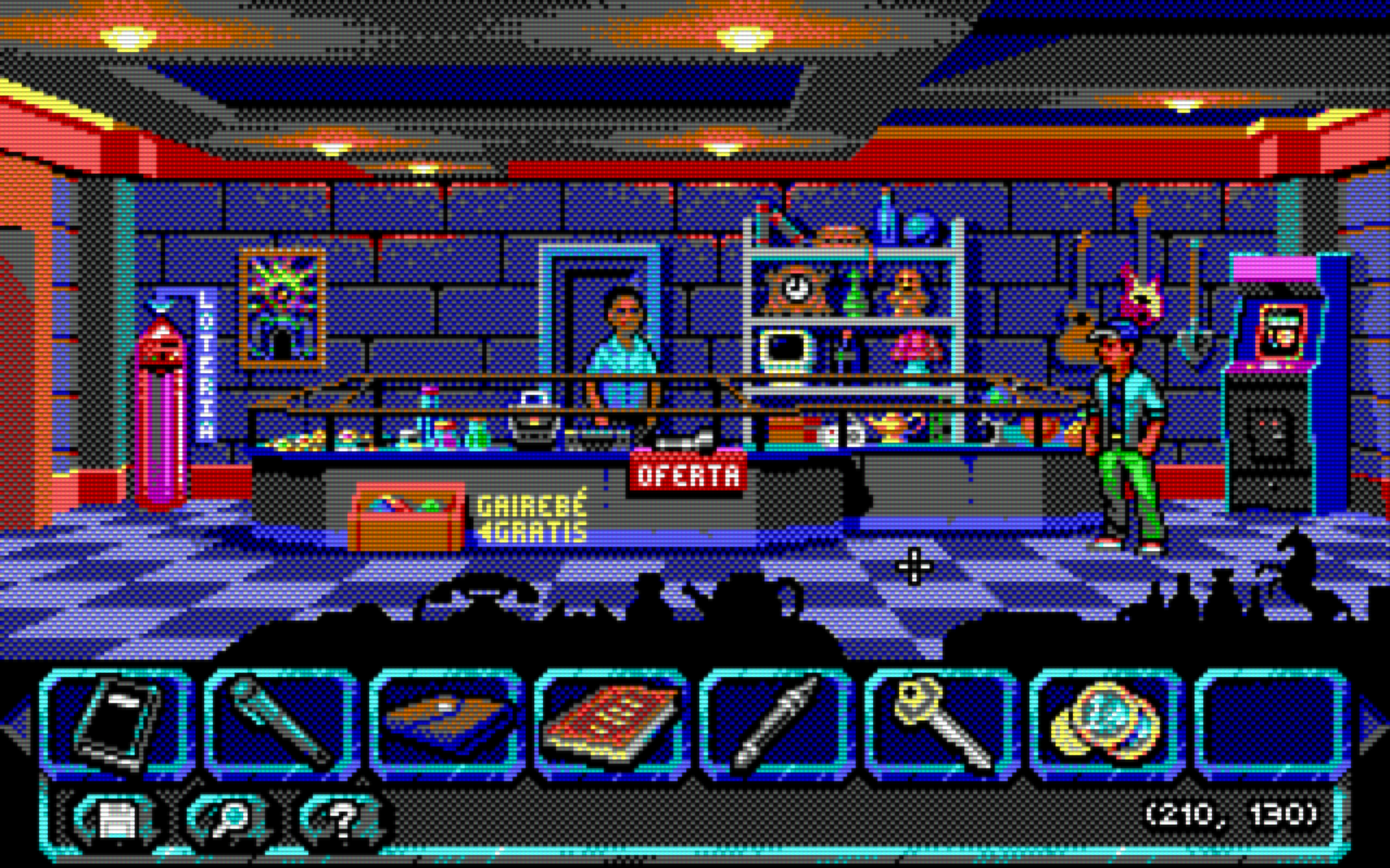 The Sideways Traveler screenshot showing the interior of a pawn shop. Lots of items on shelves and an arcade machine in the right corner.